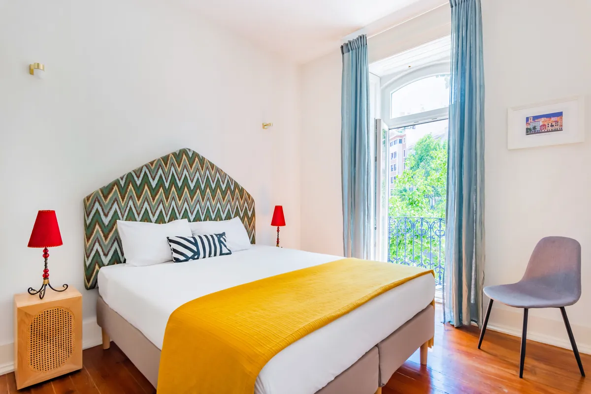 Bedroom in a short-term rental apartment in Lisbon managed by BnBird